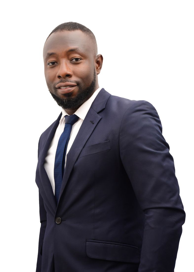 Portrait of Abubakar Issaka in a navy suit